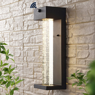 Miranda 5.13" Modern Industrial Iron/Glass Seeded Glass with Dusk-to-Dawn Sensor Integrated LED Outdoor Sconce - JONATHAN Y