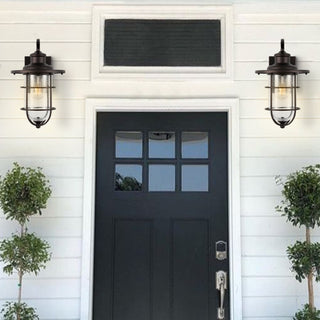 Westfield 10.5" Iron/Seeded Glass Rustic Industrial Cage LED Outdoor Lantern - JONATHAN Y