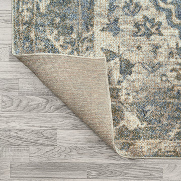 Pavel Distressed Medallion Low-Pile Machine-Washable Area Rug