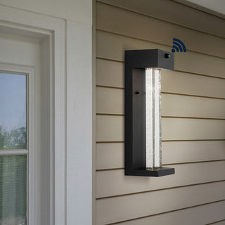 Miranda 5.13" Modern Industrial Iron/Glass Seeded Glass with Dusk-to-Dawn Sensor Integrated LED Outdoor Sconce - JONATHAN Y