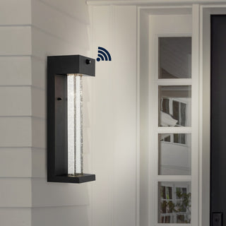 Miranda 5.13" Modern Industrial Iron/Glass Seeded Glass with Dusk-to-Dawn Sensor Integrated LED Outdoor Sconce - JONATHAN Y