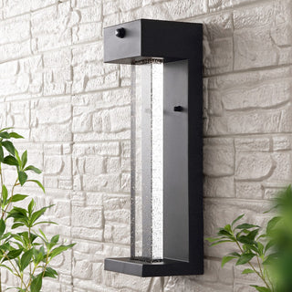 Miranda 5.13" Modern Industrial Iron/Glass Seeded Glass with Dusk-to-Dawn Sensor Integrated LED Outdoor Sconce - JONATHAN Y