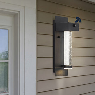 Horizone 5.5" Minimalist Industrial Iron/Glass Seeded Glass with Dusk-to-Dawn Sensor Integrated LED Outdoor Sconce - JONATHAN Y