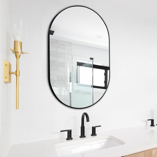 Milly 24 in. W x 36 in. H Medium Oval Metal Framed Wall Mirror - JONATHAN Y
