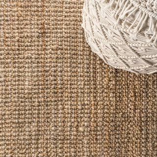 Pata Hand Woven Chunky Jute With Fringe Area Rug