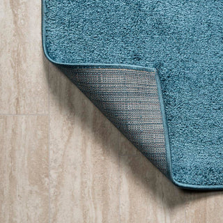 Haze Solid Low-pile Area Rug Turquoise