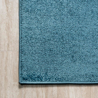 Haze Solid Low-pile Area Rug Turquoise