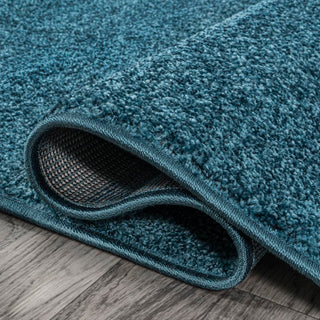 Haze Solid Low-pile Area Rug Turquoise