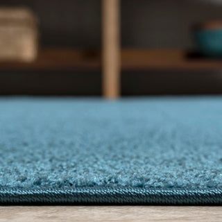 Haze Solid Low-pile Area Rug Turquoise