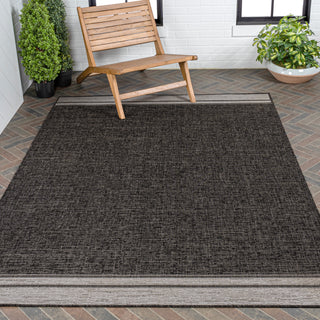 Alda Modern Minimalist Mingled Solid Indoor/Outdoor Area Rug - JONATHAN Y
