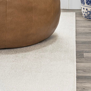 Twyla Classic Solid Low-Pile Machine-Washable Area Rug